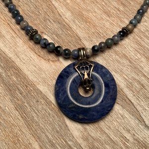 Sterling silver sodalite or lapis lazuli (not sure which) Circle of life pendant